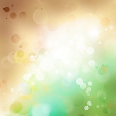 Fototapeta na wymiar Abstract green and brown bokeh blur space background