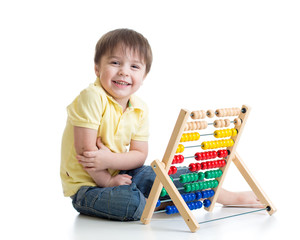 Child playing with abacus toy © Oksana Kuzmina