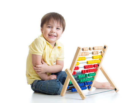 Child playing with abacus toy