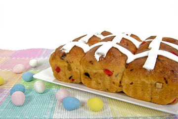 Easter hot cross buns with candy eggs