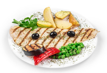 Grilled fish fillet with tasty vegetables.