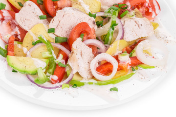 Warm meat salad with vegetables.