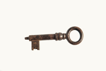 Old vintage key isolated on white background