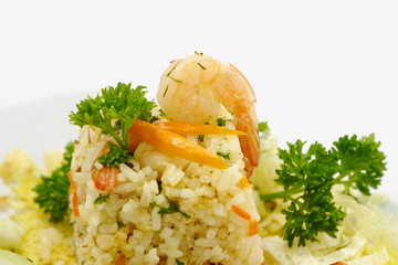 Fried rice with shrimp and parsley leaves.