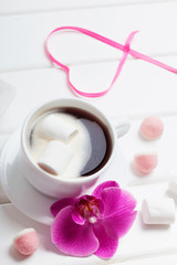cup of coffee with marshmallow for valentine's day