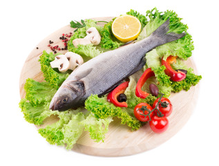Composition of fresh seabass and vegetables.