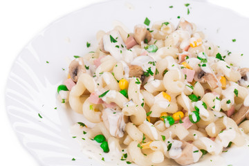 Pasta cavatappi with vegetables and sausage.