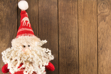 Santa Claus christmas decoration on wooden background