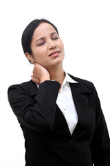 Business woman suffering from neck pain