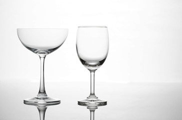 Empty wine glass and cocktail glass art composition creative