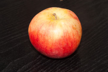 Fresh red apple on the table