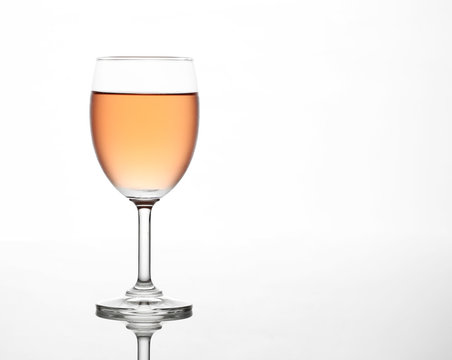 The sparking rose wine in the wine glass