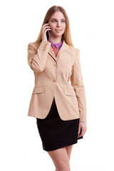 Fototapeta premium Young businesswoman talking to the phone