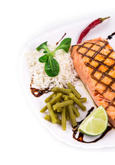 Roasted salmon fillets with rice.