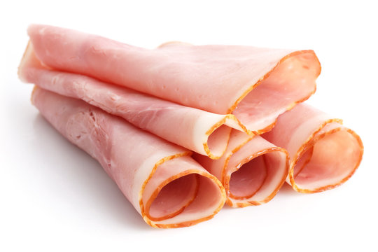 Premium slices of ham arranged on white.
