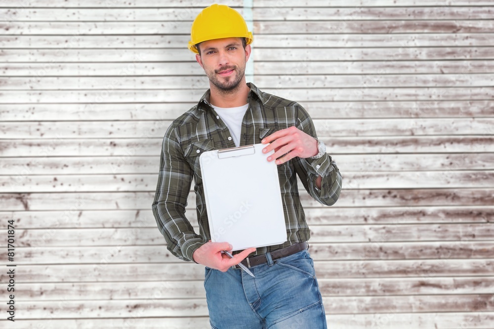 Poster Composite image of smiling manual worker holding clipboard