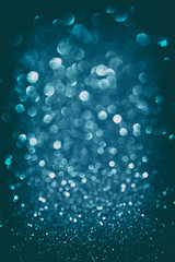 glitter vintage lights background. light silver and blue. defocu