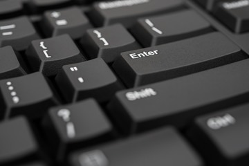 black keyboard closeup, selective focus