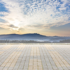 Brick floor and sky mountain for background