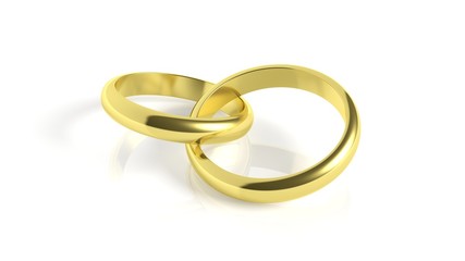 Pair of gold wedding rings, isolated on white