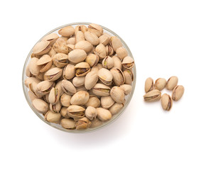 Pistachio nuts in a glass bowl with clipping path