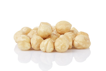 Fototapeta na wymiar heap of peeled hazelnuts isolated