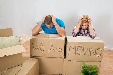 Stressed Couple In New Home