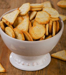 Crackers on a wooden background.