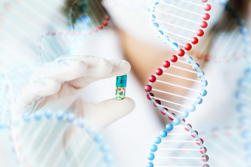 close up of scientist holding pill in lab