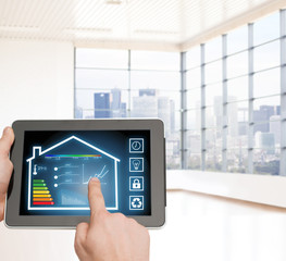 close up of man hands touching tablet pc screen