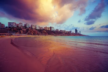 Fototapeten Netanya city at sunset, sea coast. Israel. © vvvita
