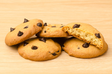 Chocolate chip cookies on wooden background