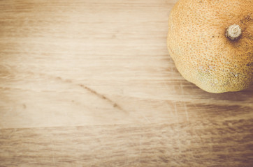 natural dried lemon on a wood surface