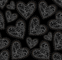 Vector seamless pattern with figured ornamental hearts