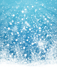 Fototapety  Boże Narodzenie niebieskie tło płatki śniegu.