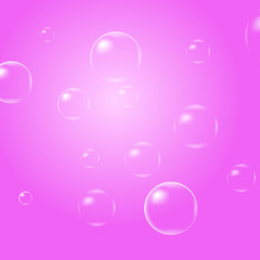 Soap bubbles on a pink background