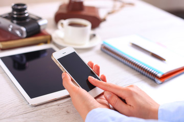 Modern workplace with digital tablet computer and mobile phone