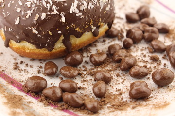 Chocolate donut and chocolate balls with cocoa powder