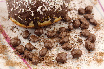 Chocolate donut and chocolate balls with cocoa powder