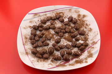 Sprinkled chocolate balls with cocoa powder