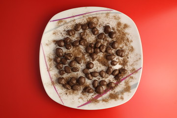 Sprinkled chocolate balls with cocoa powder