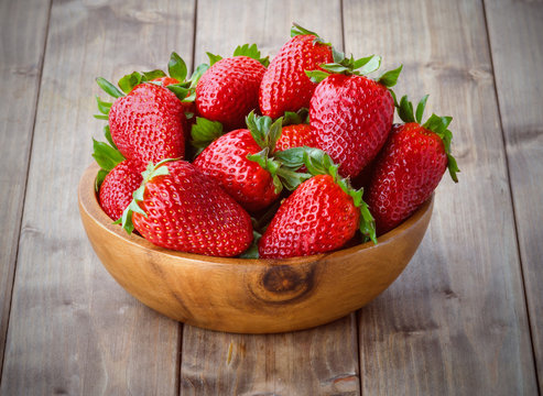 Strawberries In A Wooden Bowl