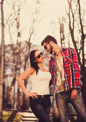 Obraz premium young couple walking on a sunny day