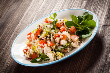 Roasted white meat, rice and vegetables