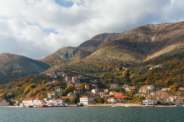 Fototapeta na wymiar Montenegro. View of Kamenari town from the sea