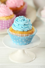 Delicious cupcakes on table  close-up
