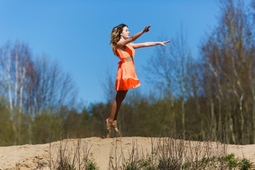 Young gymnast doing exercises