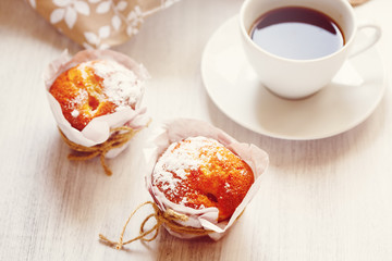 Sweet Fresh Baked Muffins with Cup of Coffee