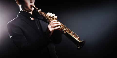 Saxophone player Saxophonist with soprano - obrazy, fototapety, plakaty