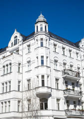 Fototapeta na wymiar An old white residential building seen in Berlin